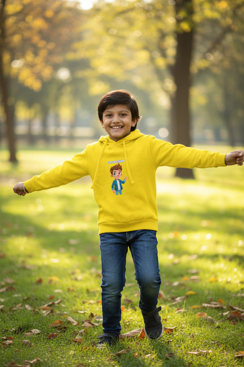 Child wearing a yellow hoodie with a cartoon character on a white background