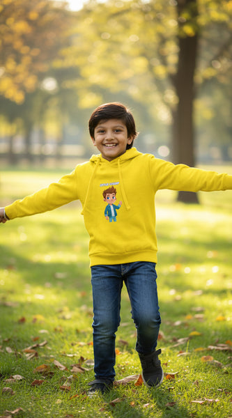 Child wearing a yellow hoodie with a cartoon character on a white background
